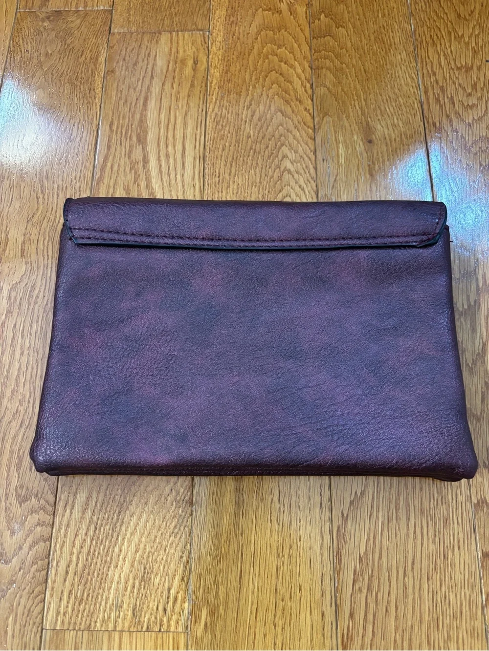 Studded Plum Leather Clutch with Turn-Lock Closure